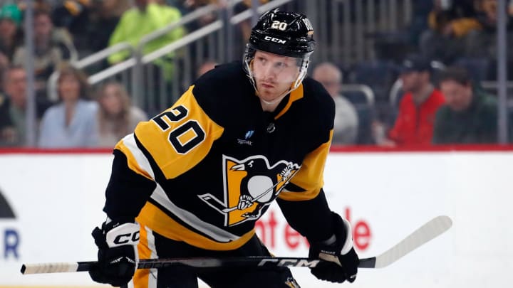 Pittsburgh Penguins center Lars Eller (20) prepares to take a face-off against the New York Rangers during the first period at PPG Paints Arena.