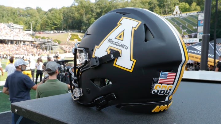 Sep 17, 2022; Boone, North Carolina, USA; An Appalachian State Mountaineers helmet sits on the bench during the second quarter against the Troy Trojans at Kidd Brewer Stadium. Mandatory Credit: Reinhold Matay-USA TODAY Sports