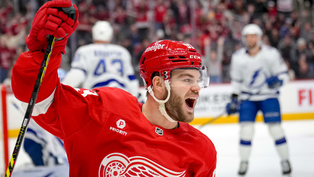 Detroit Red Wings forward Alex DeBrincat celebrates a goal against the Tampa Bay Lightning at Little Caesars Arena.