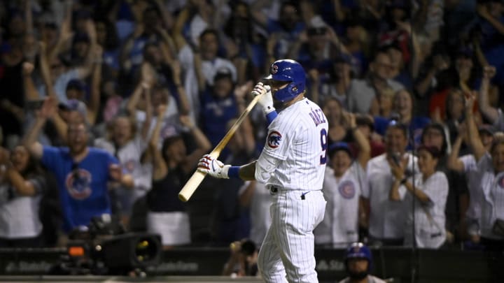 Jul 26, 2021; Chicago, Illinois, USA;  Chicago Cubs shortstop Javier Baez (9) reacts after hitting a walk off single against the Cincinnati Reds during the ninth inning at Wrigley Field.