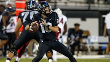 Nov 1, 2018; Orlando, FL, USA; UCF Knights quarterback McKenzie Milton (10) throws a touchdown pass during the first quarter against the Temple Owls at Spectrum Stadium. Mandatory Credit: Reinhold Matay-USA TODAY Sports