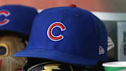 Jun 26, 2017; Washington, DC, USA; The cap and glove of a Chicago Cubs baseball player (9) rest in the dugout against the Washington Nationals at Nationals Park. 