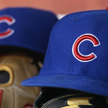 Jun 26, 2017; Washington, DC, USA; The cap and glove of a Chicago Cubs baseball player (9) rest in the dugout against the Washington Nationals at Nationals Park. 