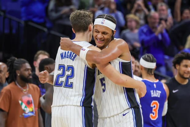 Orlando Magic forward Franz Wagner and forward Paolo Banchero celebrate their 117-108 win against the New York Knicks.