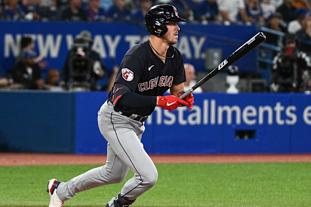 Nolan Jones swings and hits a single 