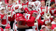 Wisconsin Badgers receivers Quintez Cephus (87) and Kendric Pryor (3) celebrate Cephus' touchdown catch during the first half against Michigan State at Camp Randall Stadium.