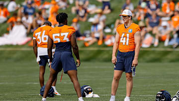 Jul 26, 2024; Englewood, CO, USA; Denver Broncos linebacker Durell Nchami (53) and linebacker Drew Sanders (41) during training camp at Broncos Park Powered by CommonSpirit. Mandatory Credit: Isaiah J. Downing-Imagn Images