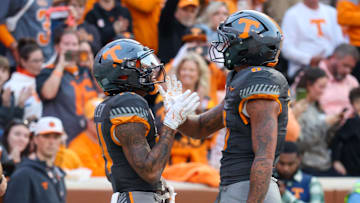 Nov 15, 2025; Knoxville, Tennessee, USA;  Tennessee Volunteers wide receiver Braylon Staley (14) and tight end Ethan Davis (0) celebrate a touchdown against the New Mexico State Aggies during the first half at Neyland Stadium. Mandatory Credit: Randy Sartin-Imagn Images
