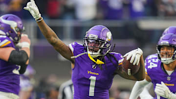 Dec 1, 2024; Minneapolis, Minnesota, USA; Minnesota Vikings cornerback Shaquill Griffin (1) celebrates his interception against the Arizona Cardinals in the fourth quarter at U.S. Bank Stadium.