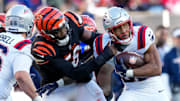 New England Patriots running back TreVeyon Henderson (32) runs the ball in the third quarter of the NFL Week 12 game between the Cincinnati Bengals and the New England Patriots at Paycor Stadium in downtown Cincinnati on Sunday, Nov. 23, 2025. The Bengals fall to 3-8 with a 26-20 loss at home.