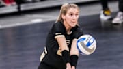 Purdue Boilermakers defensive specialist Julia Kane (21) passes the ball 