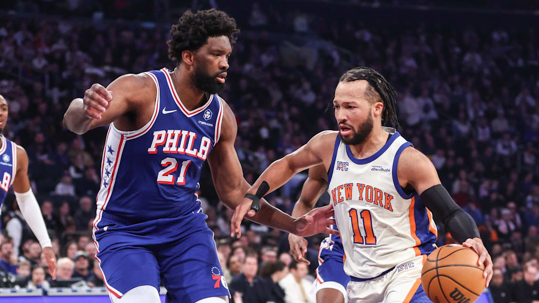 Jan 3, 2026; New York, New York, USA; Philadelphia 76ers center Joel Embiid (21) defends against New York Knicks guard Jalen Brunson (11) in the first quarter at Madison Square Garden. Mandatory Credit: Wendell Cruz-Imagn Images