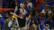 Apr 7, 2025; San Antonio, TX, USA; Florida Gators head coach Todd Golden reacts after cutting the net in the national championship game of the Final Four of the 2025 NCAA Tournament at the Alamodome.Mandatory Credit: Scott Wachter-Imagn Images