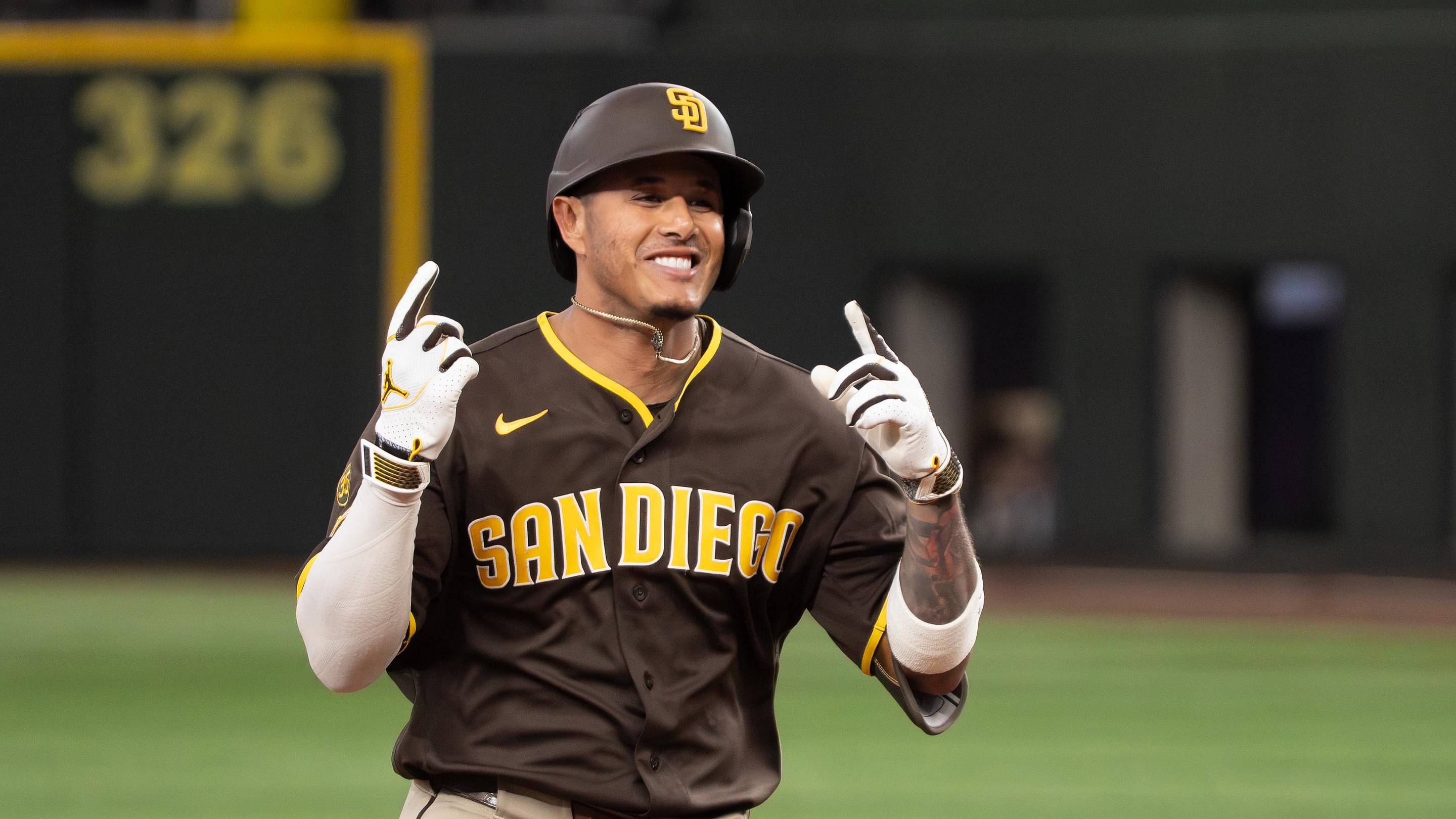 Jun 20, 2026; Arlington, Texas, USA; San Diego Padres third baseman Manny Machado (13) circles the bases after hitting a three-run home run against the Texas Rangers during the tenth inning at Globe Life Field. Mandatory Credit: Raymond Carlin III-Imagn Images