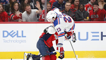Dec 9, 2023; Washington, District of Columbia, USA; New York Rangers defenseman Adam Fox (23) trips