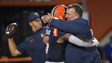 Aug 29, 2024; Champaign, Illinois, USA;  Illinois Fighting Illini head coach Bret Bielema hugs running back Josh McCray (6) before the first half at Memorial Stadium. Mandatory Credit: Ron Johnson-Imagn Images