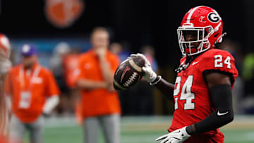 Georgia defensive back Malaki Starks (24) warms up before the start of the NCAA Aflac Kickoff Game in Atlanta, on Saturday, Aug. 31, 2024.