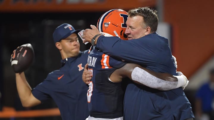 Aug 29, 2024; Champaign, Illinois, USA;  Illinois Fighting Illini head coach Bret Bielema hugs running back Josh McCray (6) before the first half at Memorial Stadium. Mandatory Credit: Ron Johnson-Imagn Images