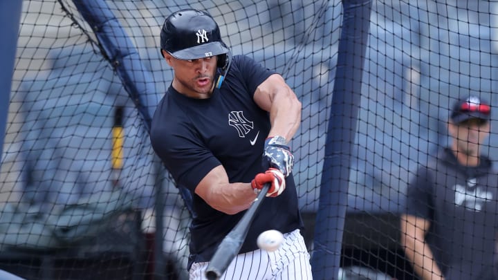 Jul 23, 2024; Bronx, New York, USA; New York Yankees injured designated hitter Giancarlo Stanton (27) works out at Yankee Stadium before a game against the New York Mets. Mandatory Credit: Brad Penner-USA TODAY Sports