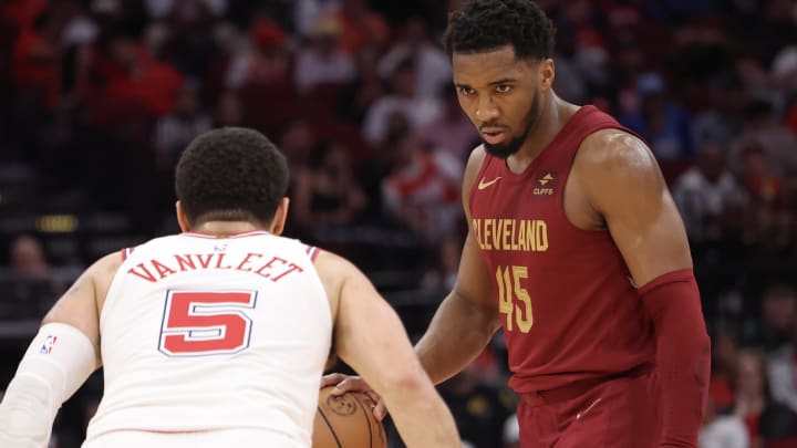 Mar 16, 2024; Houston, Texas, USA;  Cleveland Cavaliers guard Donovan Mitchell (45) dribbles against Houston Rockets guard Fred VanVleet (5) in the second half at Toyota Center. Mandatory Credit: Thomas Shea-USA TODAY Sports