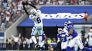 Dallas Cowboys safety Donovan Wilson intercepts the ball against the New York Giants during overtime.