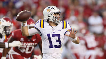Oct 19, 2024; Fayetteville, Arkansas, USA; LSU Tigers quarterback Garrett Nussmeier (13) passes during the first quarter against the Arkansas Razorbacks at Donald W. Reynolds Razorback Stadium. Mandatory Credit: Nelson Chenault-Imagn Images