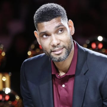 Dec 18, 2016; San Antonio, TX, USA; Former San Antonio Spurs power forward Tim Duncan smiles during a ceremony to retire his No. 21 jersey after an NBA basketball game between the Spurs and the New Orleans Pelicans at AT&T Center. 