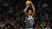 Apr 3, 2025; Brooklyn, New York, USA; Brooklyn Nets forward Dariq Whitehead (0) shoots a three point jump shot against the Minnesota Timberwolves during the first half at Barclays Center. Mandatory Credit: Gregory Fisher-Imagn Images