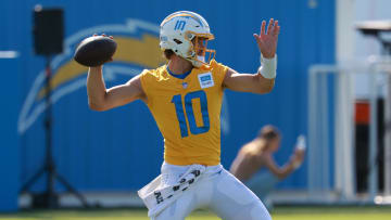 Jul 24, 2024; El Segundo, CA, USA;  Los Angeles Chargers quarterback Justin Herbert (10) throws during the first day of training camp at The Bolt.