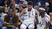 Nov 12, 2025; Oklahoma City, Oklahoma, USA; Oklahoma City Thunder guard Jalen Williams (8), center Chet Holmgren (7), and guard Shai Gilgeous-Alexander (2) talk while sitting on the bench during the fourth quarter against the Los Angeles Lakers at Paycom Center. Mandatory Credit: Alonzo Adams-Imagn Images