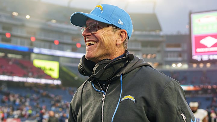 Dec 28, 2024; Foxborough, Massachusetts, USA; Los Angeles Chargers head coach Jim Harbaugh reacts after defeating the New England Patriots at Gillette Stadium. Mandatory Credit: David Butler II-Imagn Images