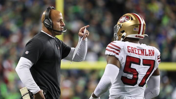 San Francisco 49ers defensive coordinator Robert Saleh (L) and linebacker Dre Greenlaw (R)