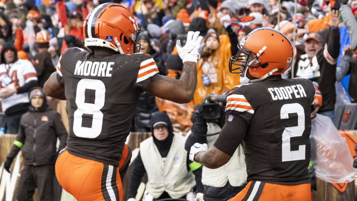 Dec 17, 2023; Cleveland, Ohio, USA; Cleveland Browns wide receiver Amari Cooper (2) celebrates his touchdown run with wide receiver Elijah Moore (8) during the fourth quarter against the Chicago Bears at Cleveland Browns Stadium. Mandatory Credit: Scott Galvin-USA TODAY Sports