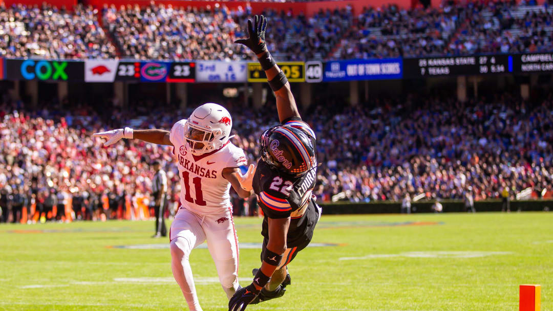 Arkansas Razorbacks defensive back Jaylon Braxton (11) breaks up a pass intended Florida Gators wide receiver Kahleil Jackson (22) at Steve Spurrier Field at Ben Hill Griffin Stadium in Gainesville, FL on Saturday, November 4, 2023 in the second half. Arkansas defeated Florida 39-36 in over-time. [Doug Engle/Gainesville Sun]