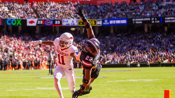 Arkansas Razorbacks defensive back Jaylon Braxton (11) breaks up a pass intended Florida Gators wide receiver Kahleil Jackson (22) at Steve Spurrier Field at Ben Hill Griffin Stadium in Gainesville, FL on Saturday, November 4, 2023 in the second half. Arkansas defeated Florida 39-36 in over-time. [Doug Engle/Gainesville Sun]