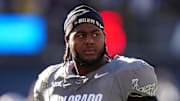 Nov 16, 2024; Boulder, Colorado, USA; Colorado Buffaloes offensive tackle Jordan Seaton (77) looks on before the game against the Utah Utes at Folsom Field.