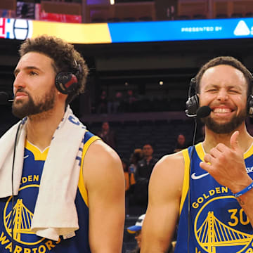 Nov 30, 2023; San Francisco, California, USA; Golden State Warriors guard Klay Thompson (11), guard Stephen Curry (30) and forward Draymond Green (23) after the game against the Los Angeles Clippers at Chase Center. Mandatory Credit: Kelley L Cox-Imagn Images