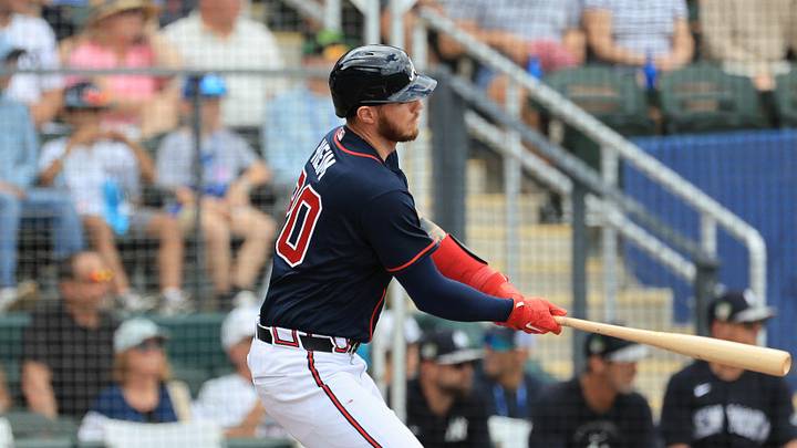 Mar 13, 2026; North Port, Florida, USA;  AAtlanta Braves catcher Jonah Heim (20) hits an RBI single during the first inning against the New York Yankees at CoolToday Park. Mandatory Credit: Kim Klement Neitzel-Imagn Images