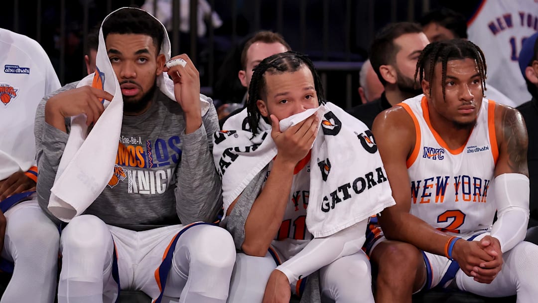 Jan 10, 2025; New York, New York, USA; New York Knicks center Karl-Anthony Towns (32) and guards Jalen Brunson (11) and Miles McBride (2) watch from the bench during the fourth quarter against the Oklahoma City Thunder at Madison Square Garden. Mandatory Credit: Brad Penner-Imagn Images