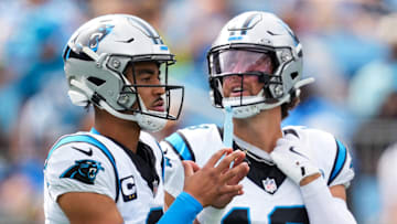 Bryce Young and Adam Thielen