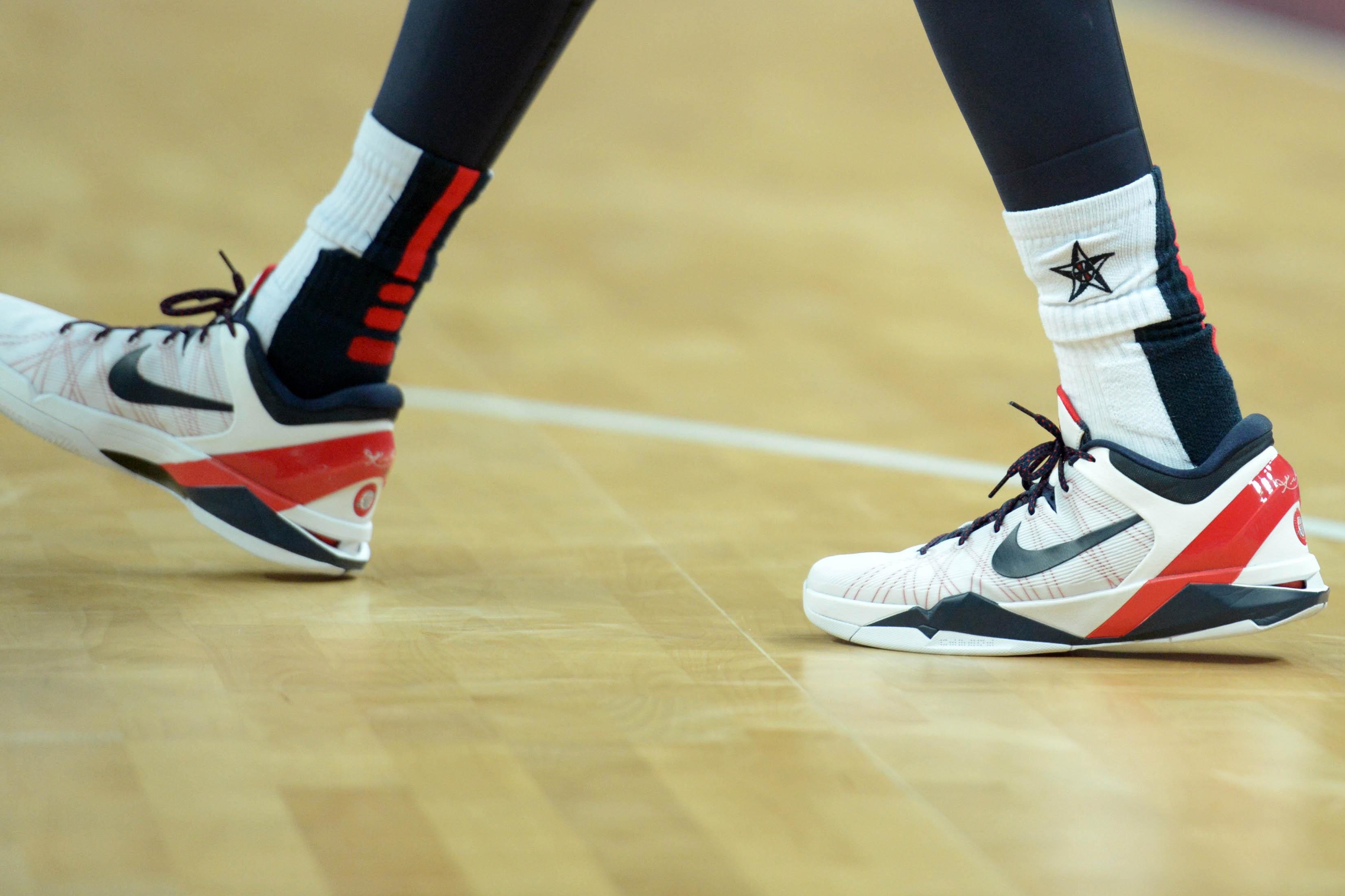 Kobe Bryant's white and navy sneakers worn during the 2012 Olympics.