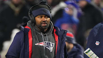 Dec 22, 2024; Orchard Park, New York, USA; New England Patriots heac coach Jerod Mayo looks on from the sideline during the first half against the Buffalo Bills at Highmark Stadium. Mandatory Credit: Gregory Fisher-Imagn Images