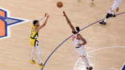 Indiana Pacers guard Tyrese Haliburton shoots a game-tying two point shot to send the game to overtime in the fourth quarter against New York Knicks center Mitchell Robinson.