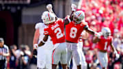 Ohio State Buckeyes safety Caleb Downs (2) and linebacker Arvell Reese (8) celebrate in the second half at Ohio Stadium on Saturday, Aug. 30, 2025 in Columbus, Ohio.
