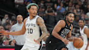 Mar 4, 2025; San Antonio, Texas, USA;  Brooklyn Nets guard Cam Thomas (24) dribbles against San Antonio Spurs forward Jeremy Sochan (10) in the second half at Frost Bank Center. Mandatory Credit: Daniel Dunn-Imagn Images
