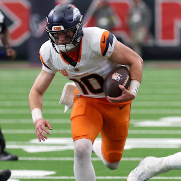 Nov 2, 2025; Houston, Texas, USA; Denver Broncos quarterback Bo Nix (10) scrambles during the second half against the Houston Texans at NRG Stadium.