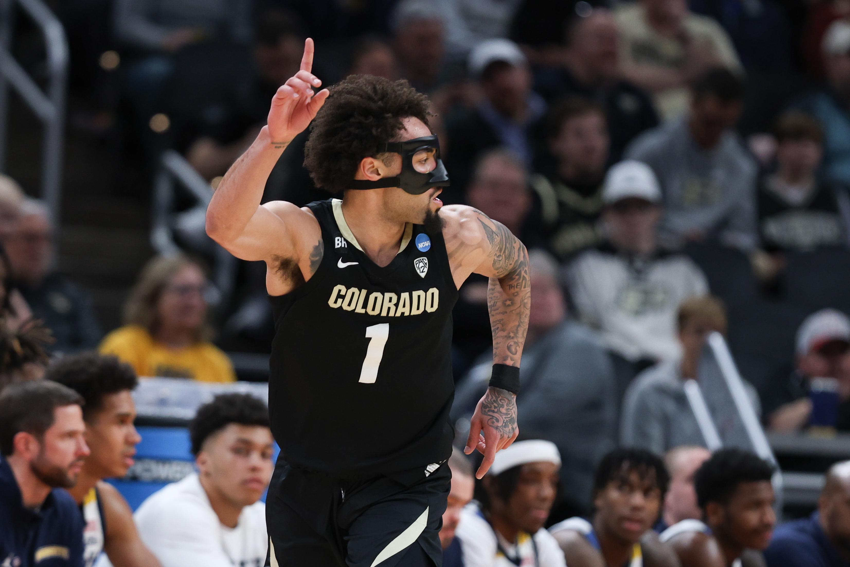Colorado Buffaloes guard J'Vonne Hadley reacts after scoring against the Marquette Golden Eagles in the NCAA Tournament
