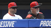 Jun 1, 2025; Cleveland, Ohio, USA; Cleveland Guardians manager Stephen Vogt (12) and pitching coach Carl Willis (51) sit in the dugout in the fourth inning against the Los Angeles Angels at Progressive Field. Mandatory Credit: David Richard-Imagn Images