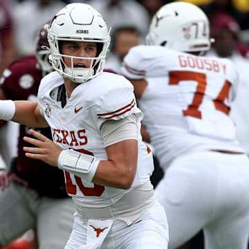 Texas Longhorns quarterback Arch Manning passes the ball during the first quarter against the Mississippi State Bulldogs at Davis Wade Stadium at Scott Field. 