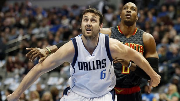 Dallas Mavericks center Andrew Bogut and Atlanta Hawks center Andrew Bogu